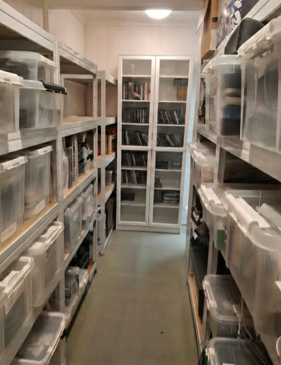 Cluttered storage room transformed into ordered, labelled shelving